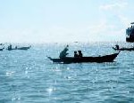Kambodscha auf einem Holzboot erkunden